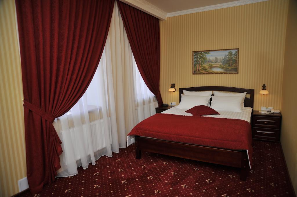 Slava Hotel Zaporizhia Habitación foto